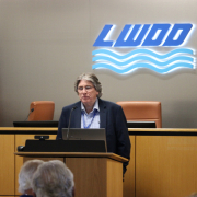 Man speaking at a podium